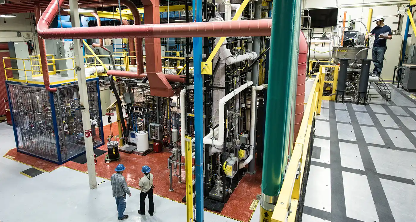 Researchers working in the Thermal Catalytic Process Development Unit.