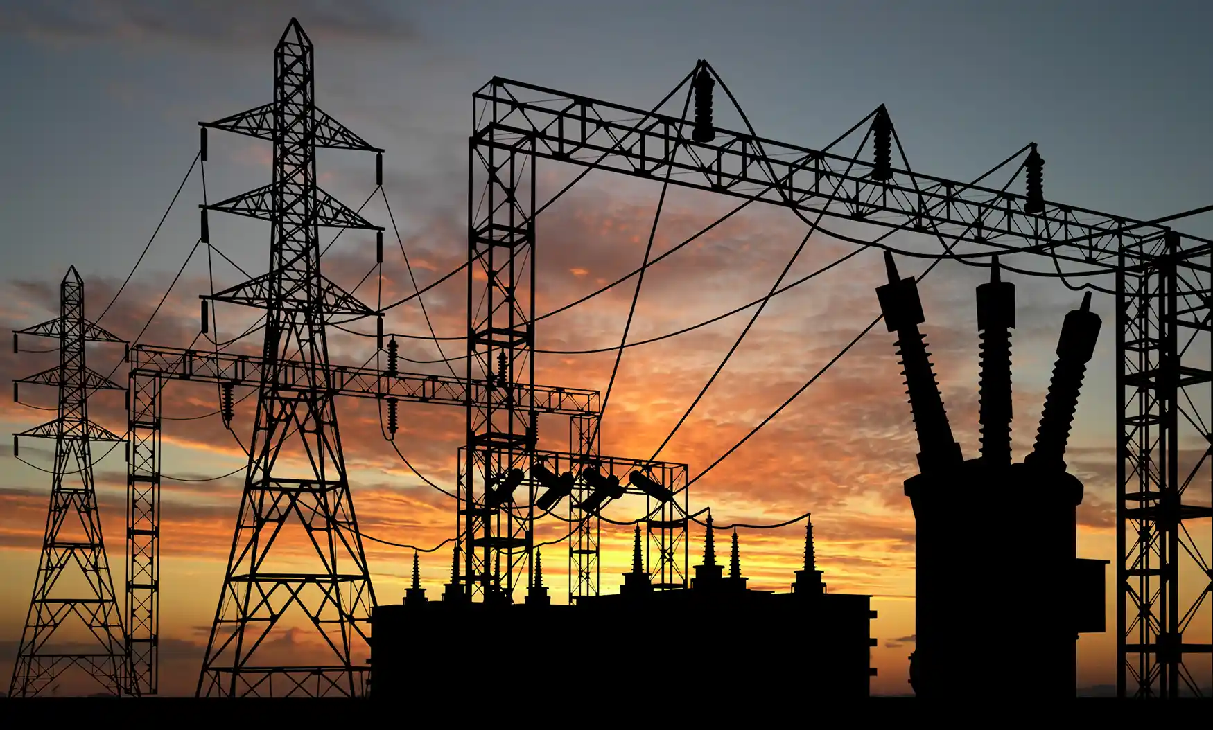 Power grid facility at dusk.