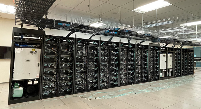 computer racks with cables in front.