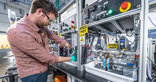 Photo of a man working in a laboratory