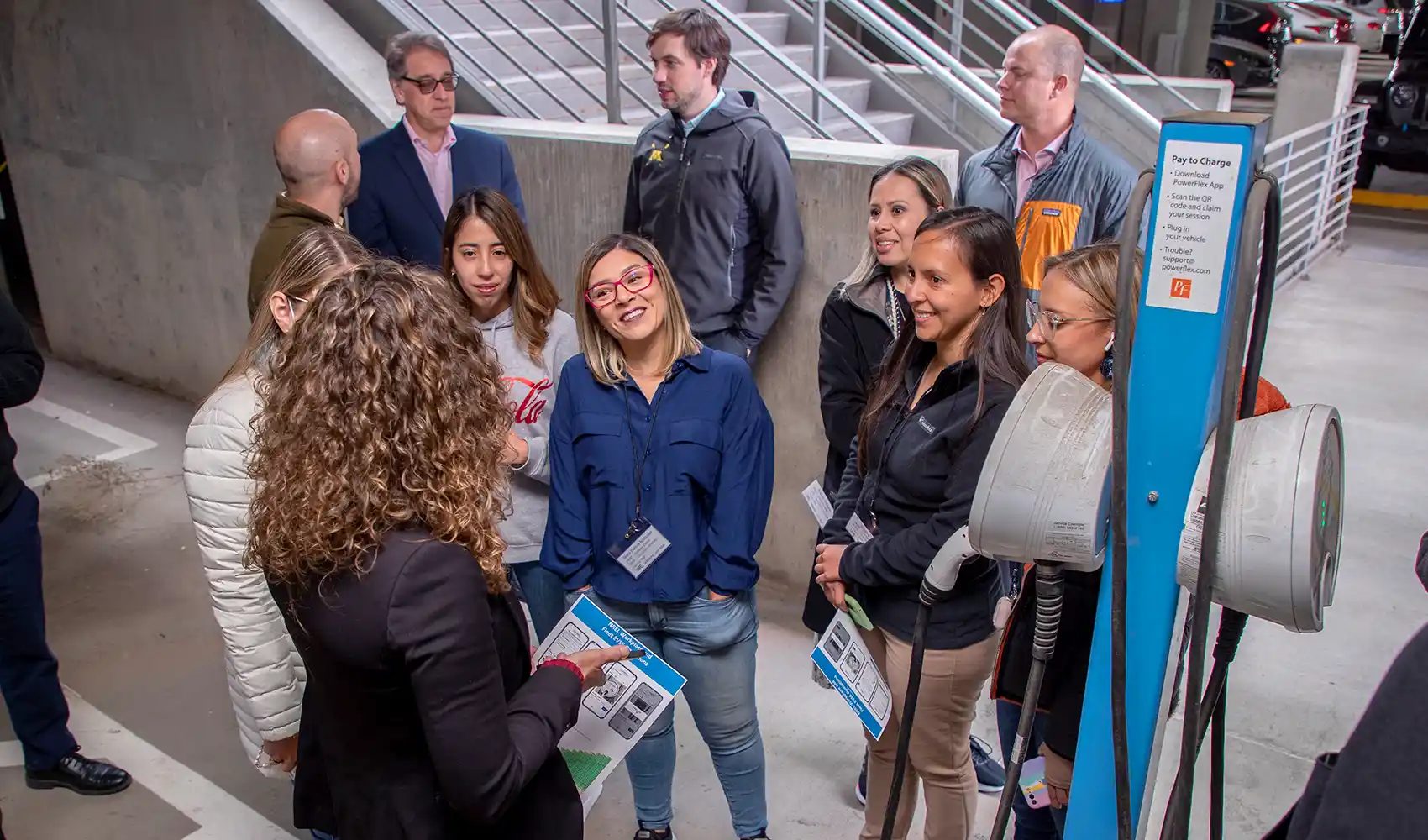 A group tours the parking facility at the NLR campus.