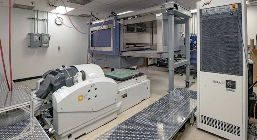 A room with grey machinery in every corner.