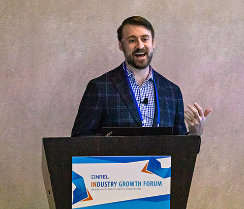 A person speaking at a podium