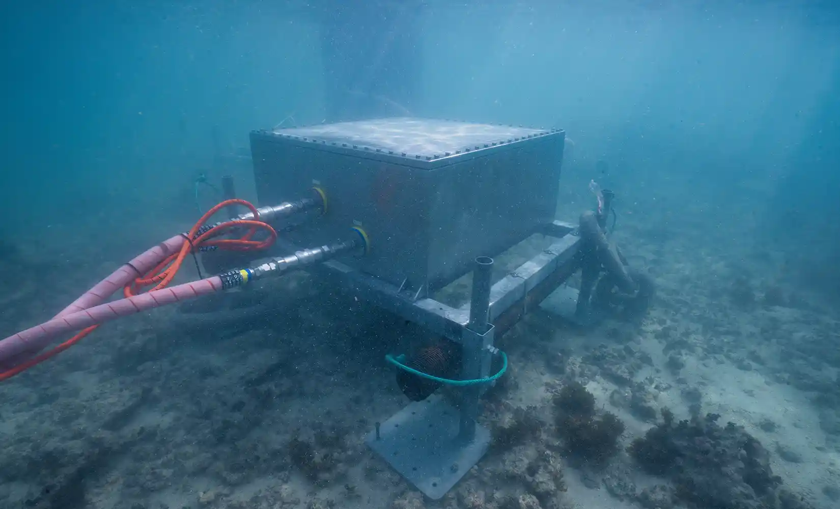 The SURF-WEC's power takeoff system assembled and working beneath the ocean's surface.