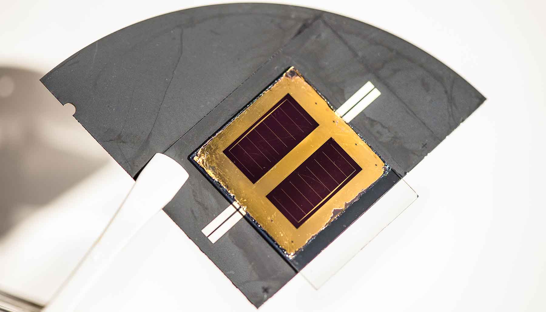 Photo shows a close-up view of a solar cell.