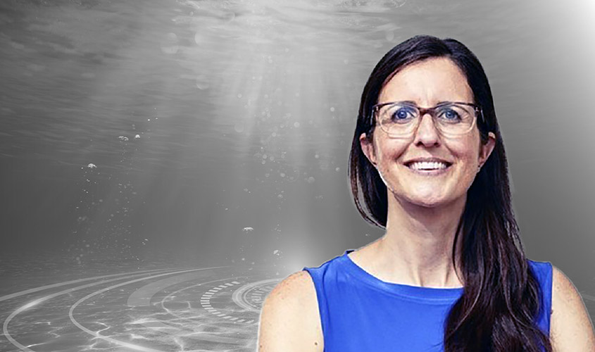 Kerry overlain on a black-and-white photo of underwater