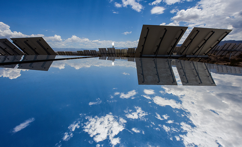 Several heliostats reflecting the sky.