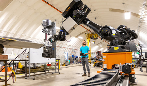 Continue reading about News Release: NREL Invites Robots To Help Make Wind Turbine Blades