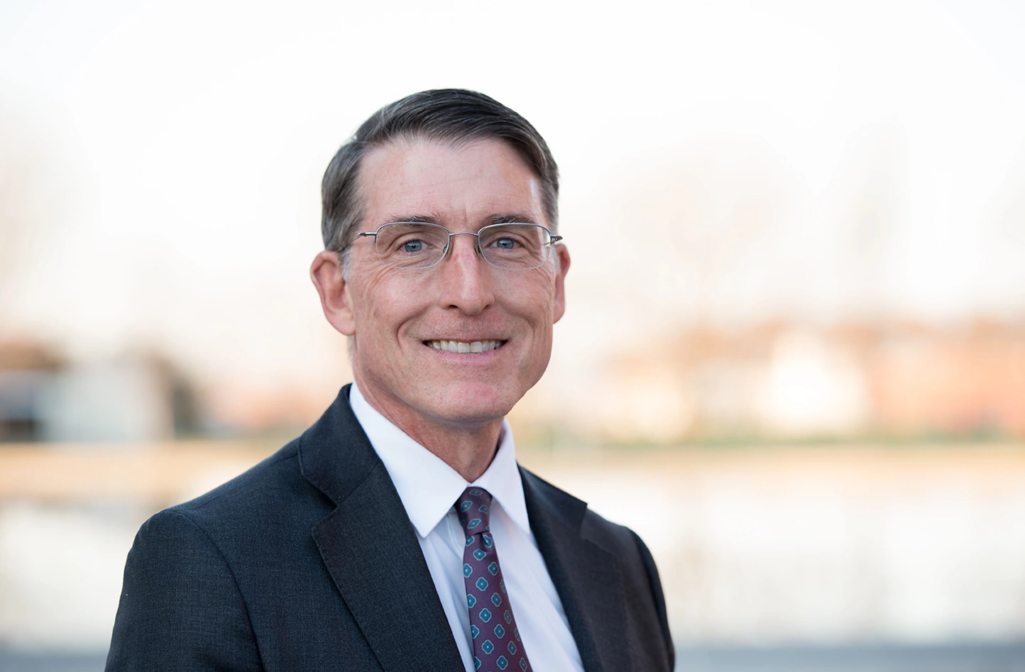Portrait photo of a man in a suit and tie