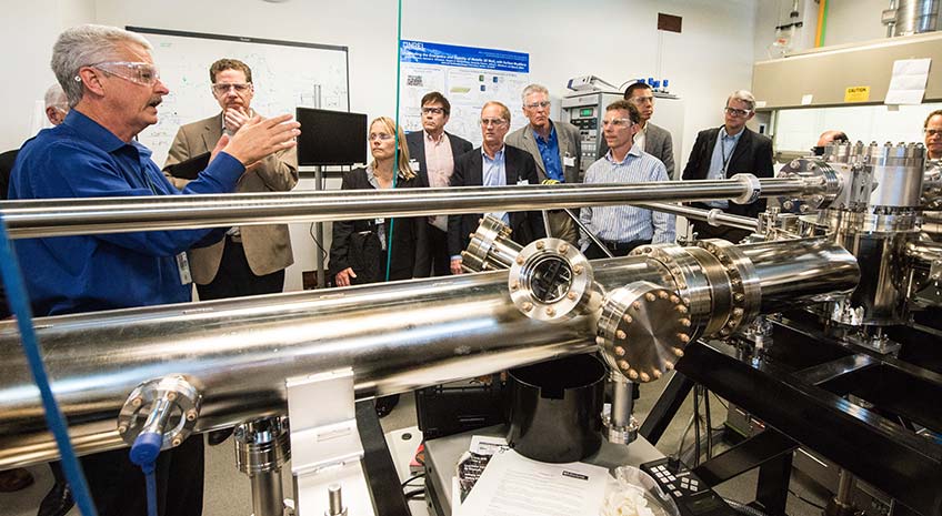 Visitors view laboratory equipment 