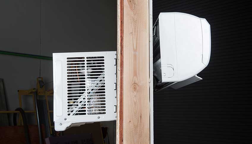 Photo shows the two sides of EcoSnap attached to a wall.