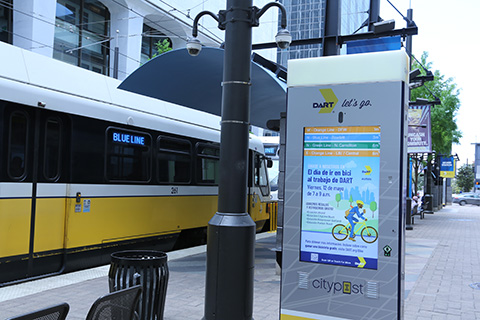 A Dallas Area Rapid Transit (DART) light rail train pulls into Akard Station.