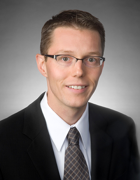 Man smiling at the camera. 