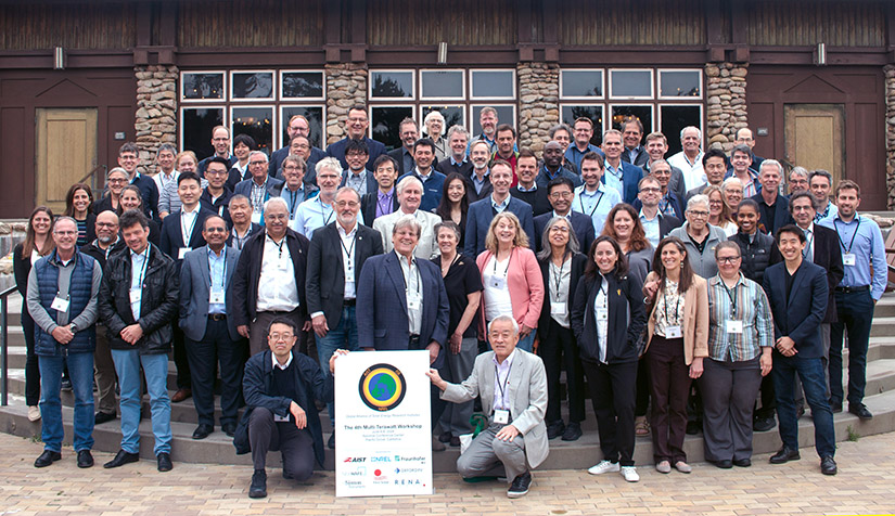 A large group of people pose for a photo.