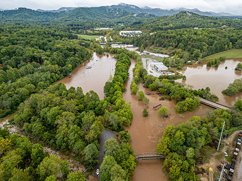 An aerial photo of flooding in a mountainous area.