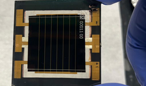 Continue reading about A hand holds a perovskite minimodule.