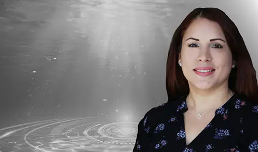 eadshot of Glorynel Ojeda Matos overlaid on a black-and-white underwater graphic.