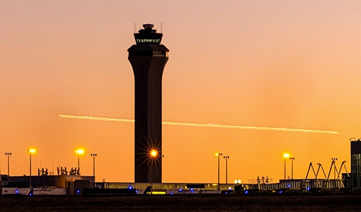 Continue reading about An airport air traffic control tower at sunset