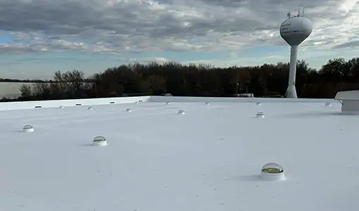A wide view of a rooftop with a white coating.