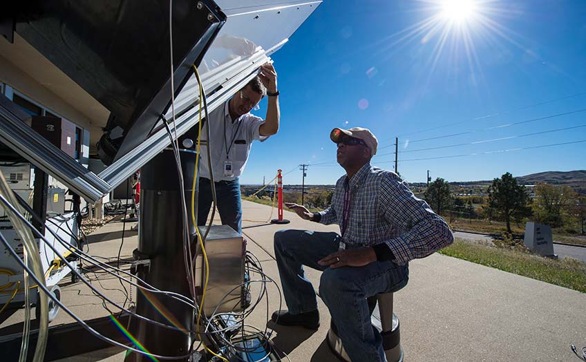 Two researchers working at the Outdoor Test Facility