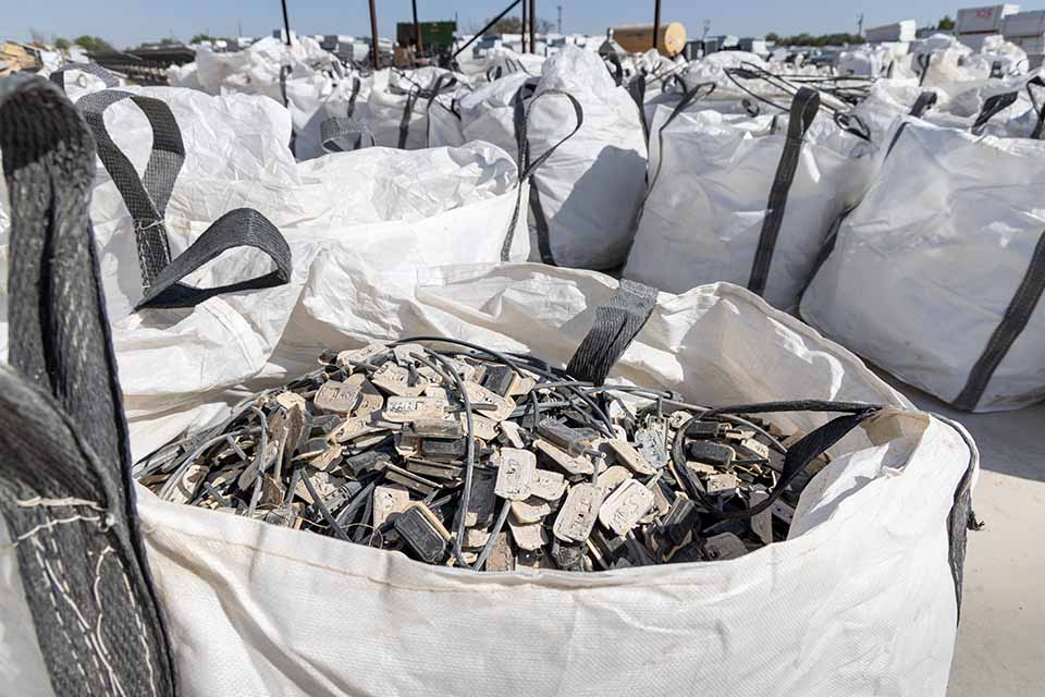 Many large, white nylon bags.