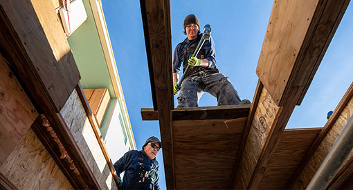 Two contractors working.
