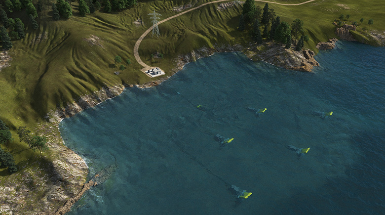 Aerial view of ocean shoreline with wave energy devices in the water.