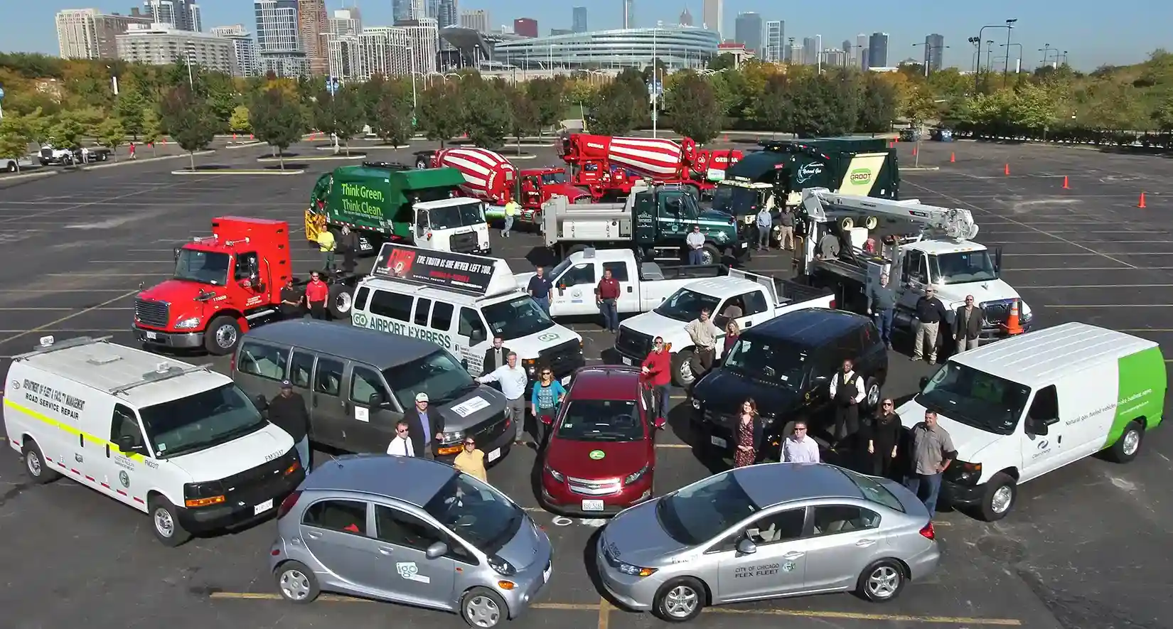 People standing within circles of a variety of different vehicle types.